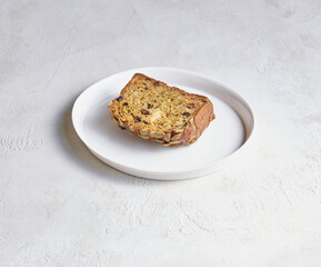 A plate filled with assorted cake and pastry pieces, photographed to highlight texture, color, and appetizing detail.