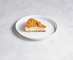 A plate filled with assorted cake and pastry pieces, photographed to highlight texture, color, and appetizing detail.