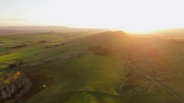 Northumberland UK: 25th Sept 2025: Sycamore Gap at Hadrian's Wall captured by drone during golden hour, showcasing stunning natural beauty and ancient history