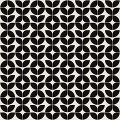 Flower shapes pattern vector background in black and white shades for wall décor, textiles, interior design and more.	
