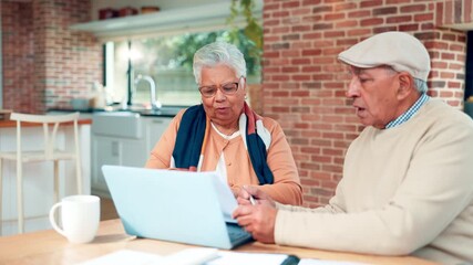 Home, upset and senior couple with laptop, financial planning or unhappy with investment loss on web. Angry, old woman and arguing with elderly man, bankruptcy and paperwork with debt in kitchen - Powered by Adobe