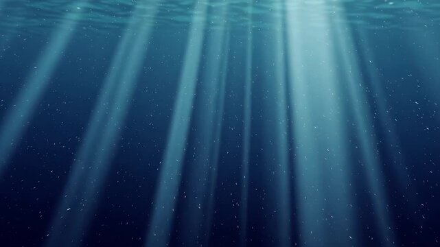Ultra deep ocean scene with soft blue light rays falling from the distant surface, camera drifting slowly through dark water as tiny plankton particles float and shimmer in the calm abyss.
