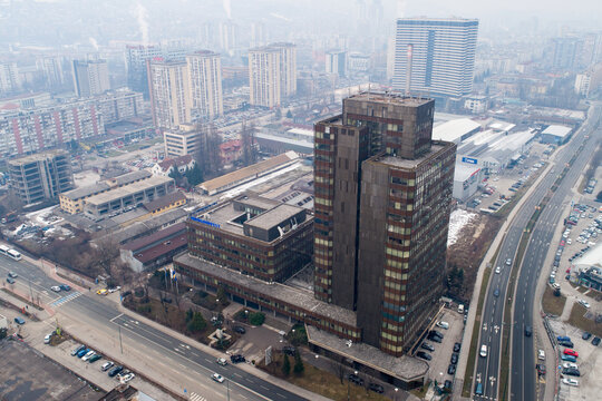 Aerial view of the iconic UNITIC towers piercing the skyline, juxtaposed against the winding roads and dense urban sprawl, Sarajevo, Federation of Bosnia and Herzegovina, Bosnia and Herzegovina.