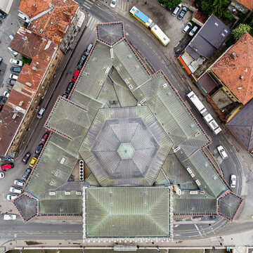 Aerial view of the striking triangular architecture of the Markale Market, surrounded by streets with buses and cars, Sarajevo, Federation of Bosnia and Herzegovina, Bosnia and Herzegovina.
