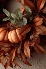 Autumnal Wreath Detail - Miniature Pumpkins and Copper Leaves with Soft, Natural Light.