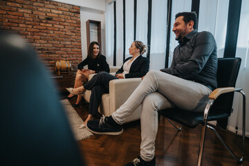 A group of professionals engaging in a discussion in a stylish office environment featuring teamwork and collaboration.