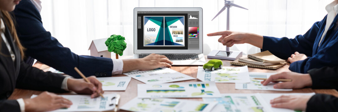 Graphic designer software for modern design of web page and commercial brisk ads showing on the computer screen