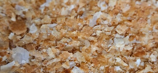 Close-up of crunching crumbs.