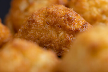 sweet cookies with coconut pieces are on the table, a group of sweet and delicious made cookies for a tea party