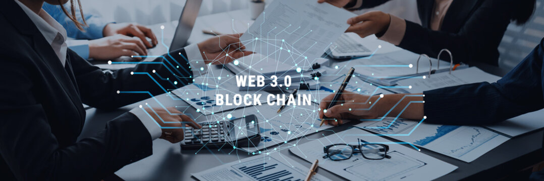 Group of professionals collaborating in a modern office, discussing blockchain technology and web 3.0 solutions while analyzing data reports and charts. Trope - Powered by Adobe