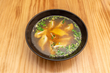 Tonkotsu Ramen Bowl with creamy pork bone broth, chashu slices, marinated egg, and bamboo shoots