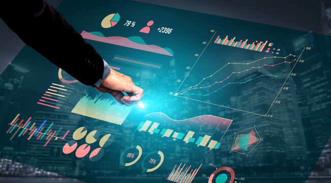 A businessman engages with an advanced data visualization interface, showcasing various charts and metrics, exemplifying modern analytics and decision-making. Impute