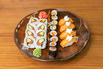 Flamed Salmon Nigiri: Quickly torch-seared salmon on rice with a glossy teriyaki sauce