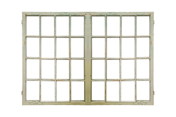 Old multi-pane wooden window frame with peeling light paint is isolated.