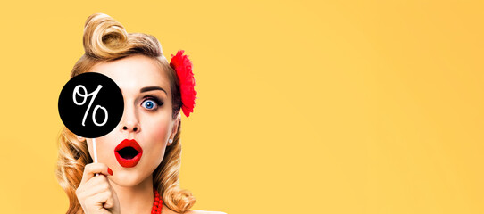 Shocked surprised cute woman cover eye signboard with % discount sign. Happy pin up girl. Retro vintage advertisement. Isolate yellow background with free space. Ophthalmology. Black Friday ad concept