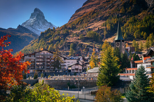Zermatt, Switzerland. Image of iconic village of Zermatt, Switzerland with the Matterhorn in the background during beautiful sunny autumn day.