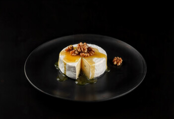 Baked Camembert with Honey and Walnuts on Black Plate