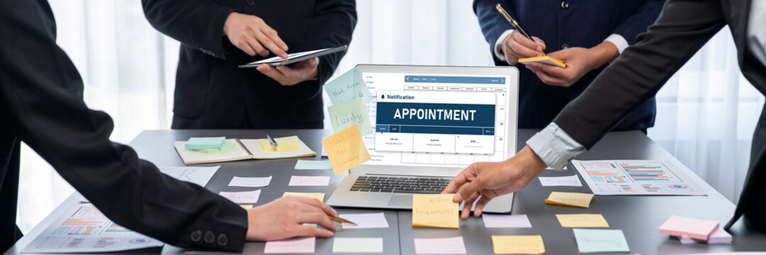 Analyst team use sticky note for creative and analytic brainstorm for business idea with BI data dashboard on laptop screen. Analysis financial data visualization tech for marketing strategy. Prodigy - Powered by Adobe