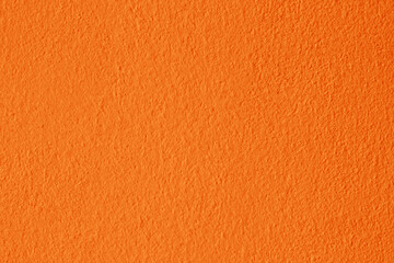Orange and yellow color concrete wall texture for background and design.