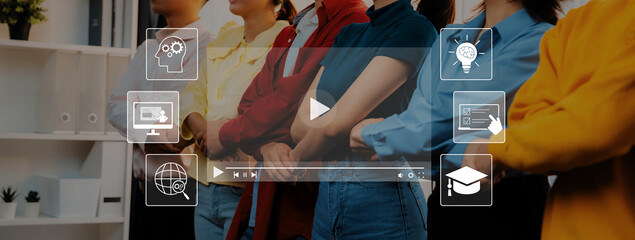 Young professionals stand together in a modern office environment, embodying teamwork and creativity, surrounded by digital icons symbolizing technology and knowledge sharing. Trope