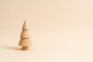 Minimalist wooden Christmas tree on cream gradient background with soft lighting and space for text, elegant festive concept for eco-friendly seasonal design and premium marketing visuals
