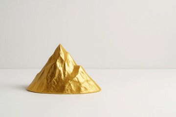 Golden mountain on white background with soft lighting and clean space for text premium concept for success wealth achievement and business growth