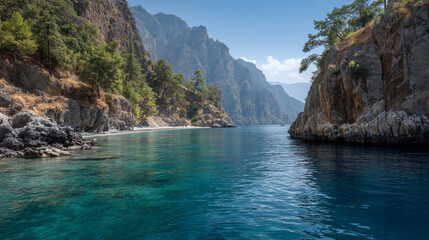 Turquoise waters flow between rocky cliffs under a bright sky on a sunny day scene