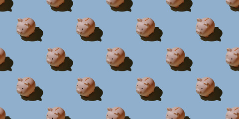 Piggy bank pattern on a blue background.