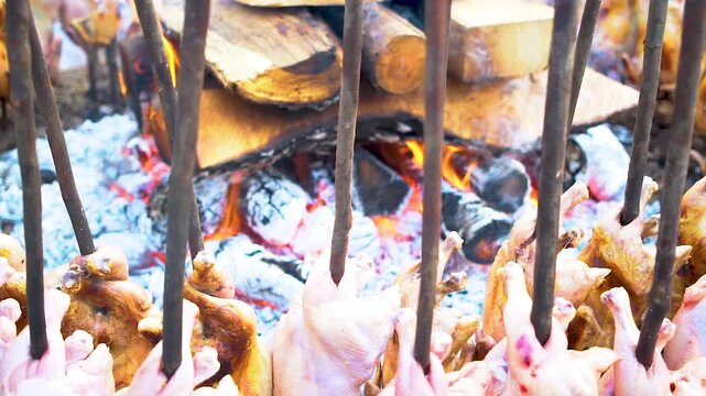 Slow motion shot of cooking of traditional Pakistani street food baloochi sajji