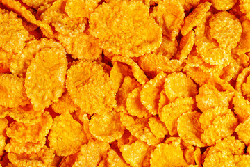 Full Frame Bright Orange Corn Flakes Breakfast Cereal Background Texture