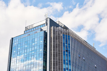 Modern business building on sky background