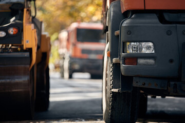 Public city street reconstruction with heavy machines.