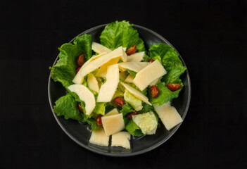 Green Salad with Lettuce, Melon Slices and Cherry Tomatoes