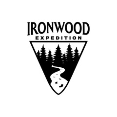 Stylized forest scene with winding trail inside a triangle badge, perfect for outdoor adventure, hiking, camping, and expedition branding. Editable Vector File
