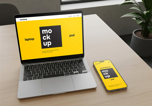 Laptop and Smartphone Mockup on Desk in Modern Office &ndash; PSD Smart Layer Display