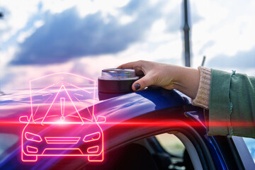 Woman using emergency warning light on broken car during trip