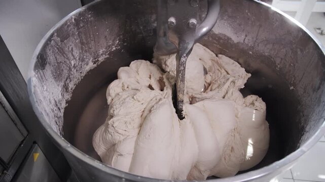 Industrial Dough Mixing Close Up in Professional Machine