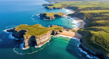 Aerial view of cliffs beaches and turquoise sea on a sunny day coast