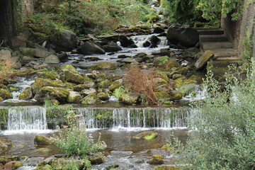 A Small Weir on a Rocky River Bed.