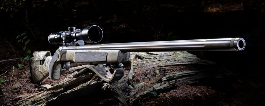 Large muzzleloading rifle of inline design in the forest