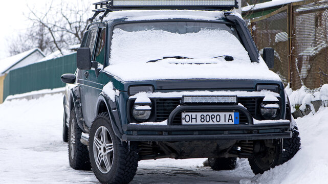 Kyiv, Ukraine. 06.07.2020. machine. Niva car. old car Lada. Niva offroad car on a street. tuned transport for hunting, tourism, army. good economical Russian car. winter season. editorial