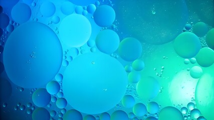 Obraz premium Abstract Blue Green Oil Bubbles Creating Fluid Circles And Oceanic Light Texture For Imagery