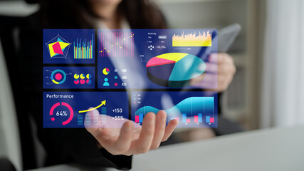 A business professional interacts with a futuristic data dashboard showcasing various charts and graphs, emphasizing performance analysis and strategic insights. Impute