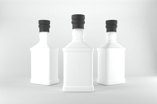 Elegant blank whiskey bottles with black caps ready for your modern branding vision for liquor spirits and alcohol products - Powered by Adobe