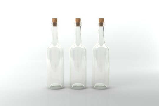 Three clear glass bottles with cork stoppers, perfect for creative design concepts and messaging