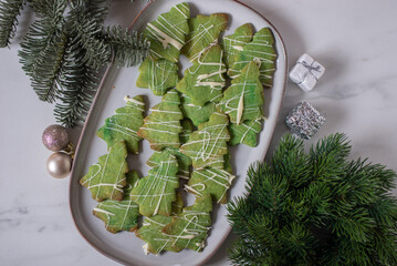 Christmas homemade gingerbread cookies on wooden table