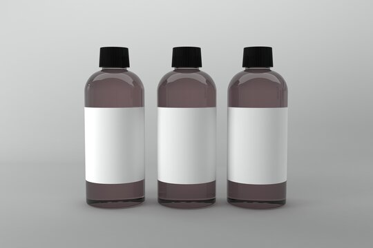 Cosmetic bottles mockup with blank labels for branding or product packaging in a studio setting