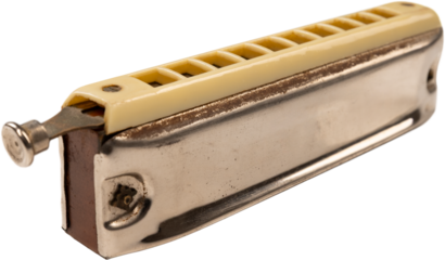 Vintage harmonica with metal body and worn texture on transparent background. Concept of blues visuals, music lessons, instrument collections, creative sound stories, merchandise, retro branding.