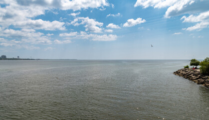 Lake Ontario with blue cloudy sky
