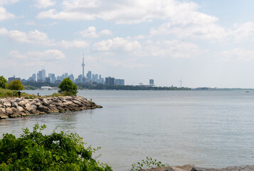 view of the rocks and city of Toronto over Lake Ontario